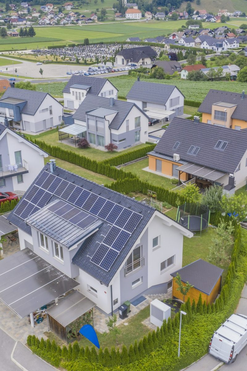 aerial-view-private-houses-with-solar-panels-roofs